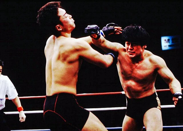 1989年のプロシューティング旗揚げ戦にてプロデビューし、91年には初代ライトヘビー級王座を獲得、94年には『VALE TUDO JAPAN OPEN』に打って出た川口健次