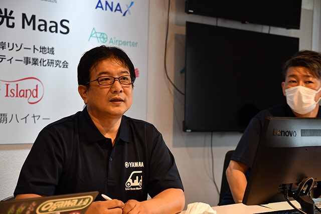 二輪で知られるヤマハにとって、グリスロは新規事業の領域。ヤマハ発動機の渡辺敬弘氏（左）は「ゆくゆくは自動運転技術を進化させ、ドライバー不足の離島・山間地域で持続可能な交通インフラとしてカートを走らせたい」と語った
