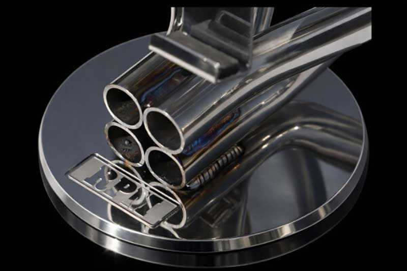 RPM がスマートフォンスタンド「DIGITAL-MANIHOLD Ver.1.0」を発売！ エキゾーストパイプの造形美を机上に表現 記事1