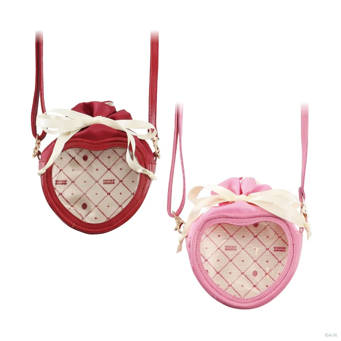 2つのハート型のショルダーバッグ。左は赤、右はピンク。どちらも白いリボンと透明な窓が付いている。